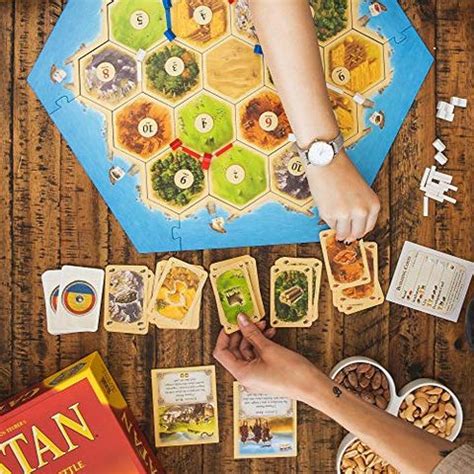 1 Catan <b>Board</b> <b>Game</b> (Base <b>Game</b>) | Family <b>Board</b> <b>Game</b> | <b>Board</b> <b>Game</b> <b>for Adults</b> and Family | Adventure <b>Board</b> <b>Game</b> | Ages 10+ | for 3 to 4 Players | Average Playtime 60 Minutes | Made by Catan Studio. . New board games 2022 for adults